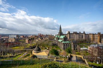 Naklejka premium The Glasgow Necropolis , Nice view and sculpture of Victorian Cemetery Monuments near Glasgow Cathedral during winter sunny day at Glasgow , Scotland : 27 February 2018