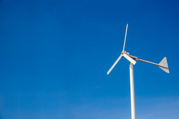 Fototapeta premium Wind Turbine Wind Power Farm on nature blue sky