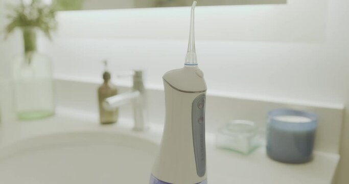 Wide Tilt Down of a Water Flosser