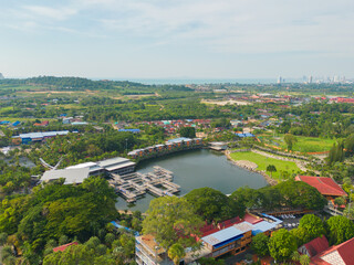 Aerial top view of green trees in Nong Nooch Tropical Garden Park. Green eco area in smart urban city at noon, Pattaya, Thailand. Environment nature landscape background.