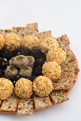 Gajak Mithai, Pista Gazak, Til Patti Or Papdi, Til Laddu Or Ladoo, Revdi And Rewri Made Of Tilgul, Mungfali, Sesame Seed, Jaggery Gud, Badam And Pista For Makar Sankranti Or Lohri Celebration