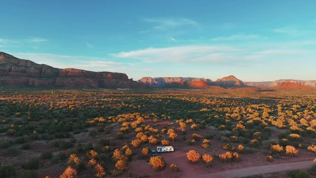 Recreational Vehicle Parked In Vegetated Desert In Sedona Red Rocks, Arizona. Aerial Drone Shot