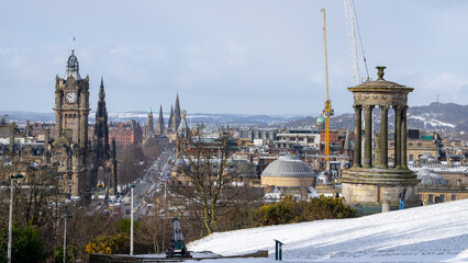 Calton Hill , Cityscape view of Edinburgh old town numerous monuments and buildings around during...