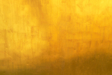 Old glod metal wall background or texture and shadow