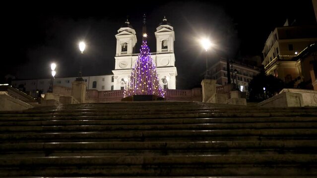 Spanish Steps in Rome, Italy at night with Christmas tree and stabling video shot.