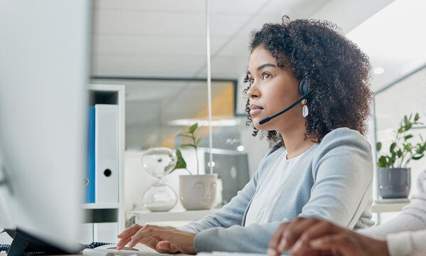 Crm, contact us or black woman in call center at customer services for a communication or telemarketing agency. Computer, microphone or African consultant talking, helping or speaking at office desk