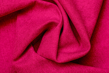 Texture of fabric. Beautiful knitted repeating pattern. Demonstrating Pantone color of the year 2023 viva magenta