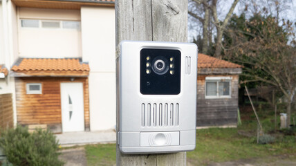 house intercom doorbell entrance home with a surveillance camera