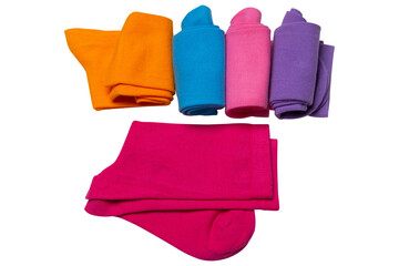 Five cotton socks of different colors are twisted and partially folded, on a white background
