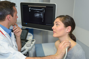 woman having neck ultrasound