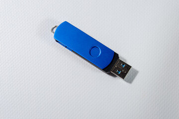 Bright blue USB drive isolated on white background