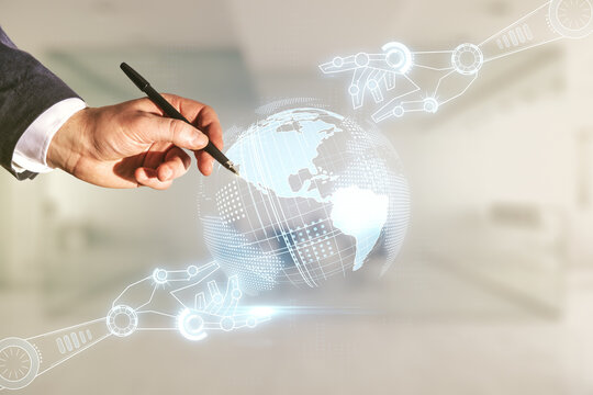 Male hand with pen draws abstract virtual robotics technology sketch with globe on blurred office background, future technology and AI concept. Double exposure - Powered by Adobe
