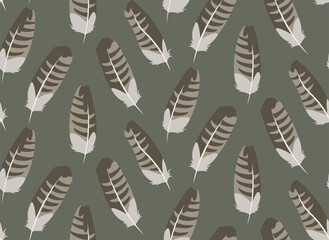 Seamless pattern with buzzard feathers. Beautiful nature texture in flat style.