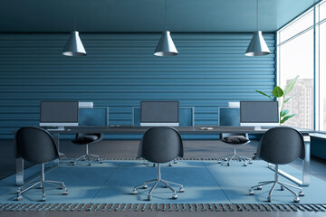 Front view on comfortable workspace table with modern computers and black chairs in spacious coworking office with city view and dark blue slatted wall background. 3D rendering