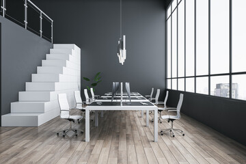Stylish workspace in coworking office with minimalistic interior design, white stairway, light table with modern computers on dark wall background, wooden floor and city view from window. 3D rendering