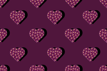 Fototapeta premium Seamless pattern with cornflowers in the shape of a heart on the viva magenta background. Valentines day card. Valentine concept. Website banner with heart.
