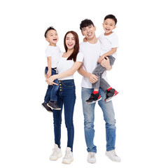 Fototapeta premium Happy Asian family standing together on white background