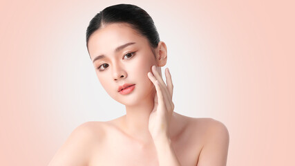 Beautiful young asian woman with clean fresh skin on beige background, Face care, Facial treatment, Cosmetology, beauty and spa, Asian women portrait.