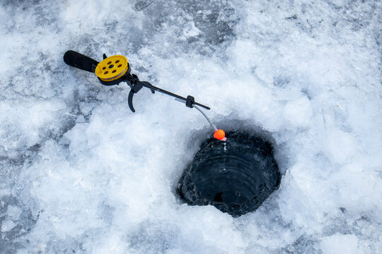 fishing rod and hole. winter fishing © Наталья Удалова