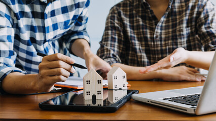 Signing home sales and insurance contracts with real estate agents, signing contracts to know the terms of buying and selling homes and real estate, contract signing ideas.