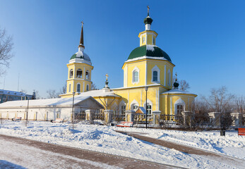 Cityscape of Irkutsk town on sunny cold winter day. View on beautiful Church of the Transfiguration...
