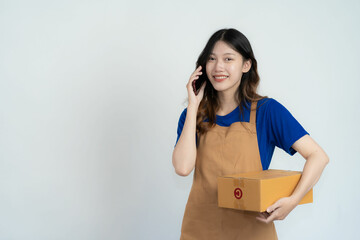 Asian woman holding smartphone and box on white background, online delivery and selling concept