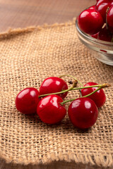 Fresh ripe cherries on wooden background
