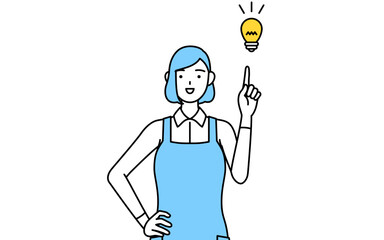 アイデアを思いついたエプロンを着た女性