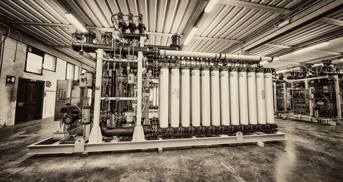 Reverse osmosis systems. Membrane locum in water treatment plant.Pipelines in a water purification plant, industrial concept.