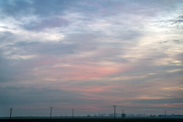 Sunrise over the fields, colourful sky