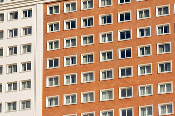 Fototapeta na wymiar Closeup of a facade of a generic residential building in Madrid downtown, Plaza de Espana. Community of Madrid, Spain, southern Europe.