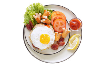 Fried rice and hot dogs, cooked fried egg, Chinese sausage and ketchup on a white background.
