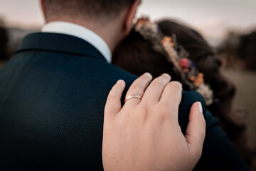 Detail of a wedding ring on hands during the big day, love is in the air