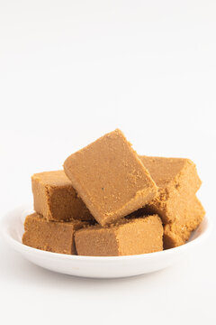 Winter Season Special Indian Til Barfi Or Burfi Also Known As Tilkut, Gajak, Gazak, Gachak Made Of Tilgul, Mungfali, Sesame Seed, Jaggery Gud, Badam And Pista For Makar Sankranti Or Lohri Celebration