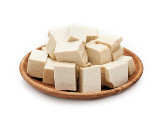 pile of white cube Tofu in wood plate isolated on white background. fresh white cube tofu isolated on background. heap of white cube tofu isolated on background