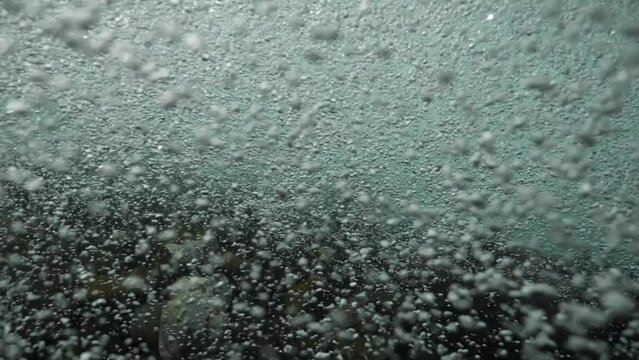 river underwater carrying alluvium in freshwater river in nature with bubbles