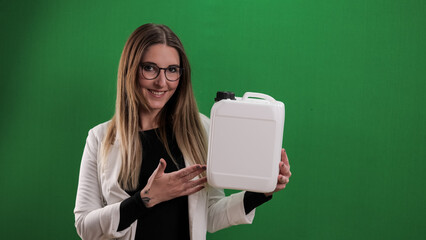 Young woman holds a canister - ideal for mock up - studio photography