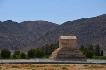 tomb of Kyros II. in Pasargadae, Iran with Zagros mountain range in background - obrazy, fototapety, plakaty