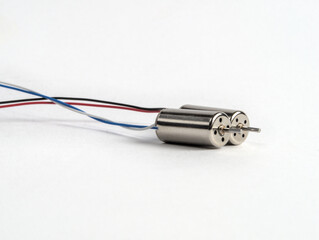 Two drone micro motors isolated on a white background, close up shot