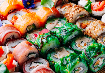 set of sushi roll in plate