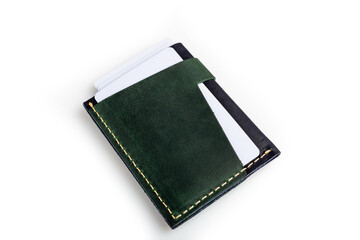 Green leather wallet with blank cards, isolated on white background