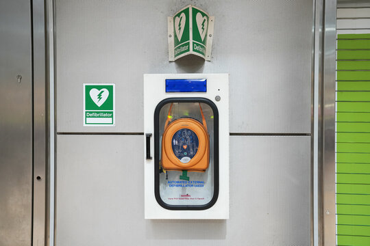 Automatic External Defibrilator (AED) device for first aid usage in a public space like train station or airport. Safety measures for public health.