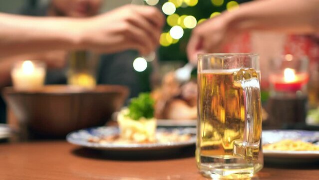 Asian group party dining at home And and they drink beer
