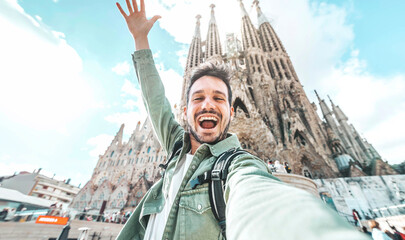 Happy tourist visiting La Sagrada Familia, Barcelona Spain 