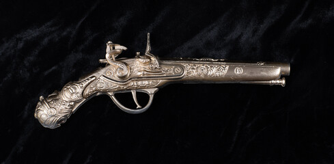 pirate pistol on black velvet