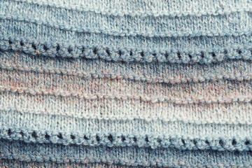 Fototapeta premium Knitted background. Knitted fabric texture, pure sheep wool, color gradient.