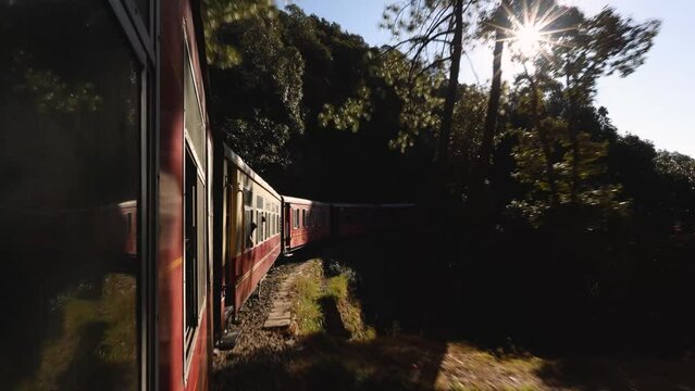 Toy train running from Kalka to Shimla or Simla capital of Himachal Pradesh north India Himalayas. Indian mountain railway