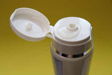 cleansing gel for facial skin care of the brand Herbalife on a yellow background