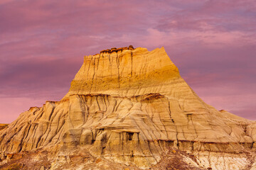 Sunrise over the barren badlands in the UNESCO World Heritage Site of Dinosaur Provincial Park,...