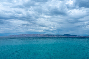 Seaview of the mediterranean coastline near Lisajn city in Croatia during cloudy summer day